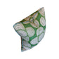 The Azteque Green Pillow by HIVE ALTERATIONS features a white circular pattern and blue piping. This handmade 22x22 accent adds custom charm to any space and is shown against a white background.