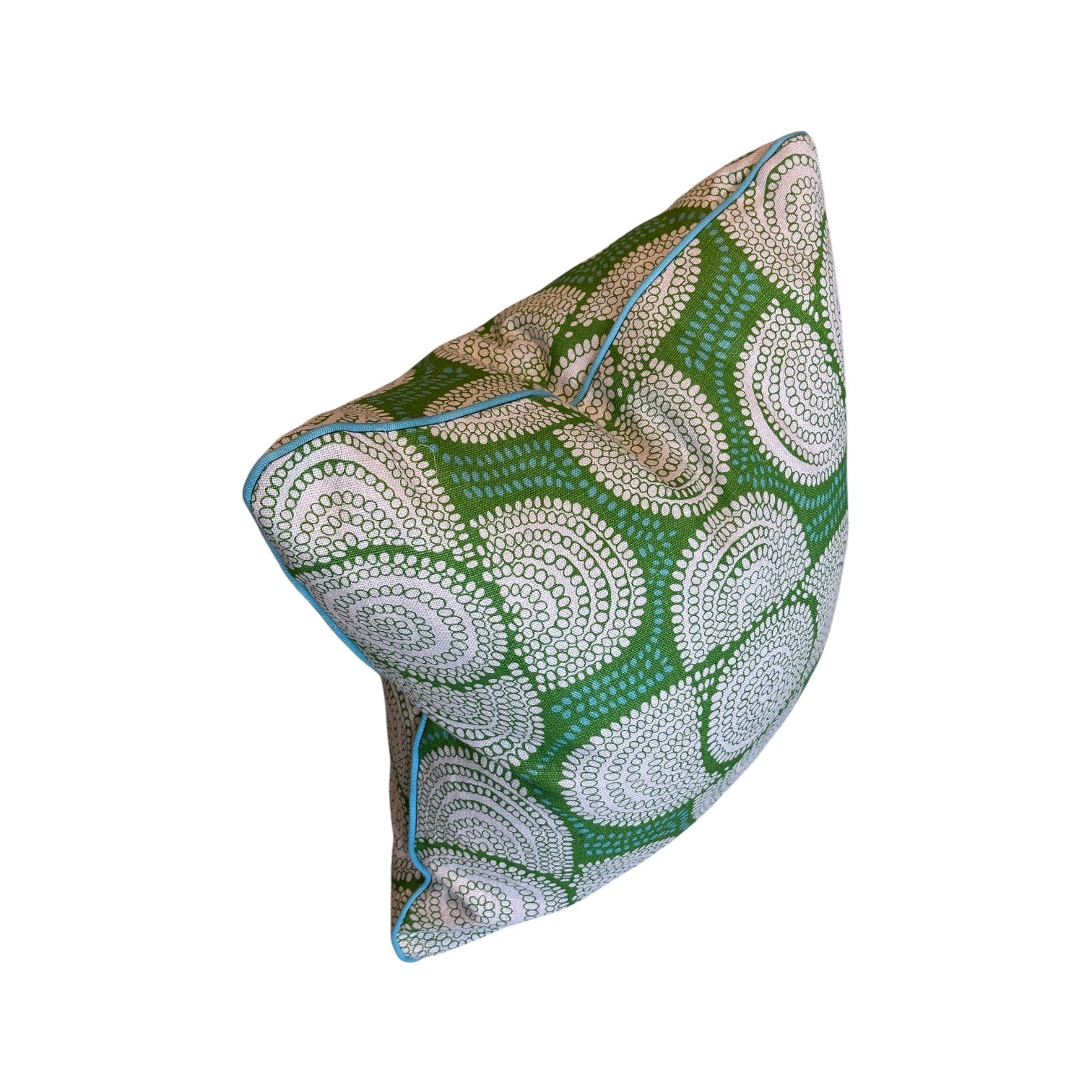 The Azteque Green Pillow by HIVE ALTERATIONS features a white circular pattern and blue piping. This handmade 22x22 accent adds custom charm to any space and is shown against a white background.