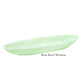 A medium mint-green, boat-shaped bowl from the Nashi Home Mint Resin Serveware Collection is showcased on a white background with "Boat Bowl Medium" below—ideal for stylish, shatter-resistant home decor.