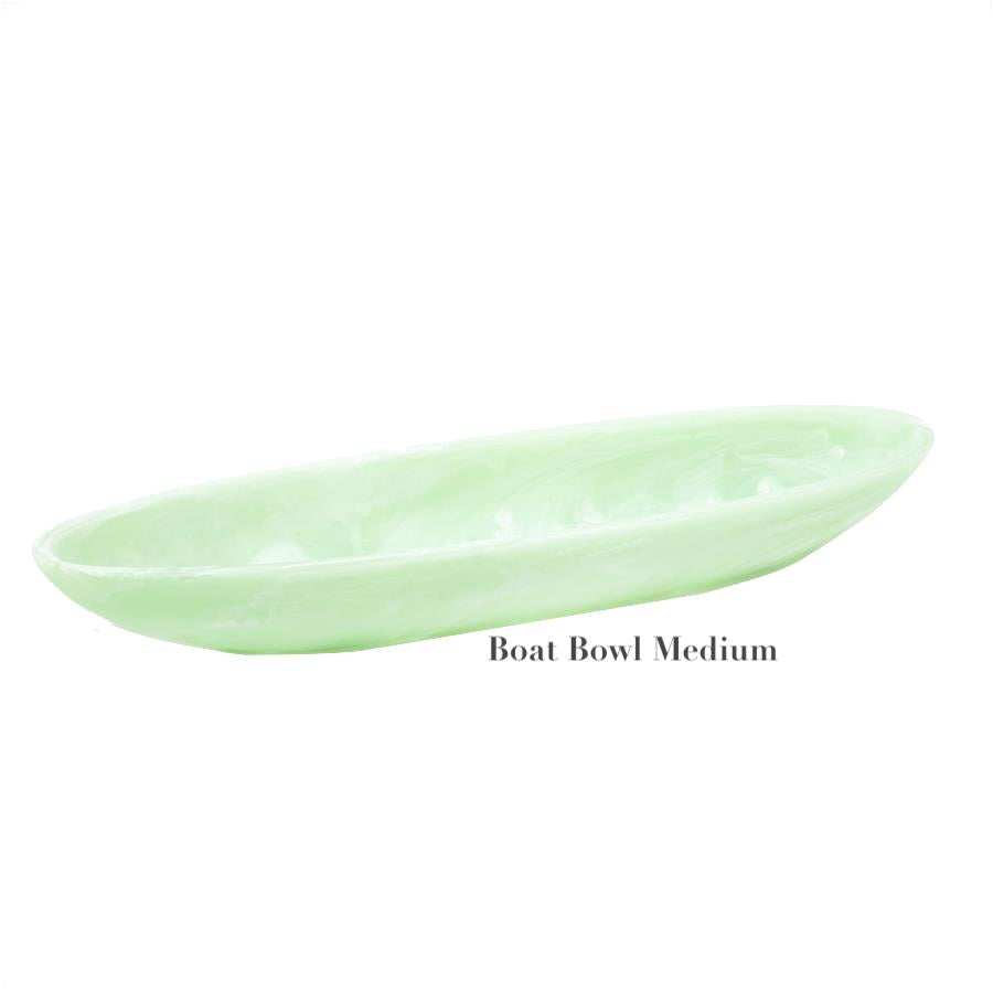 A medium mint-green, boat-shaped bowl from the Nashi Home Mint Resin Serveware Collection is showcased on a white background with "Boat Bowl Medium" below—ideal for stylish, shatter-resistant home decor.