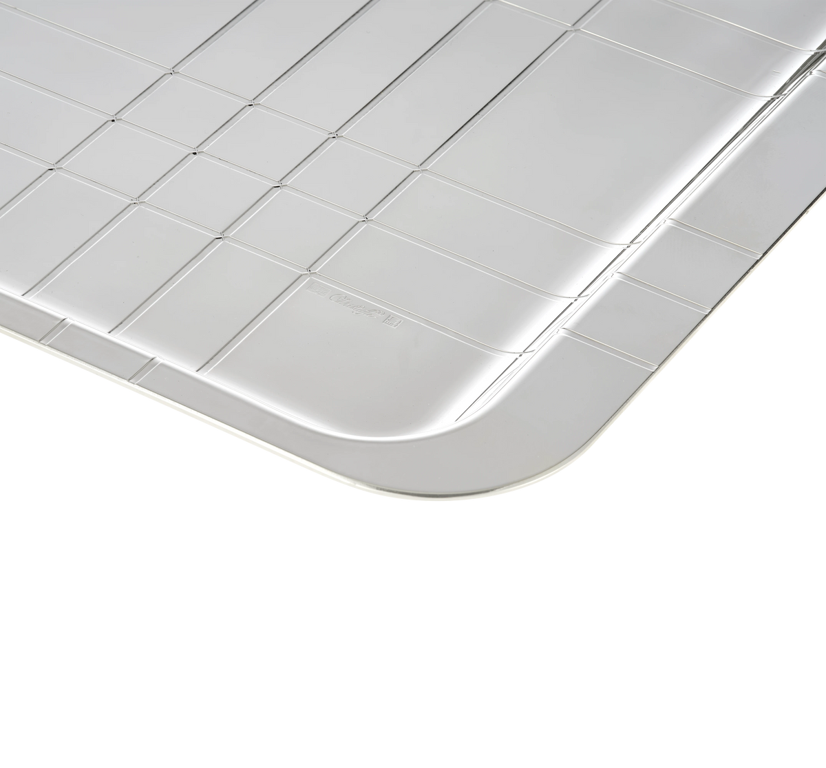Close-up of the Christofle Graphik Silver-Plated Tray, showcasing its contemporary metallic grid pattern and rounded edges against a plain white background. This refined piece from the Graphik collection brings modern elegance to any setting.