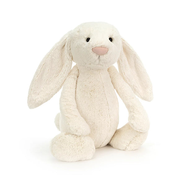 A white stuffed bunny from Jellycat designs, sitting on a white background.