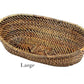 The Calaisio Oval Bread Basket Collection showcases large, oval-shaped eco-crafted baskets made from natural materials by skilled artisans, displayed on a white background.