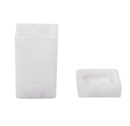 The Nashi Home Bath Collection in Swirl White features two white objects: a tall, standing container and a flat, square dish with rounded edges. Their translucent design, evoking resin collections, captures the serene beauty of Sydney beaches.