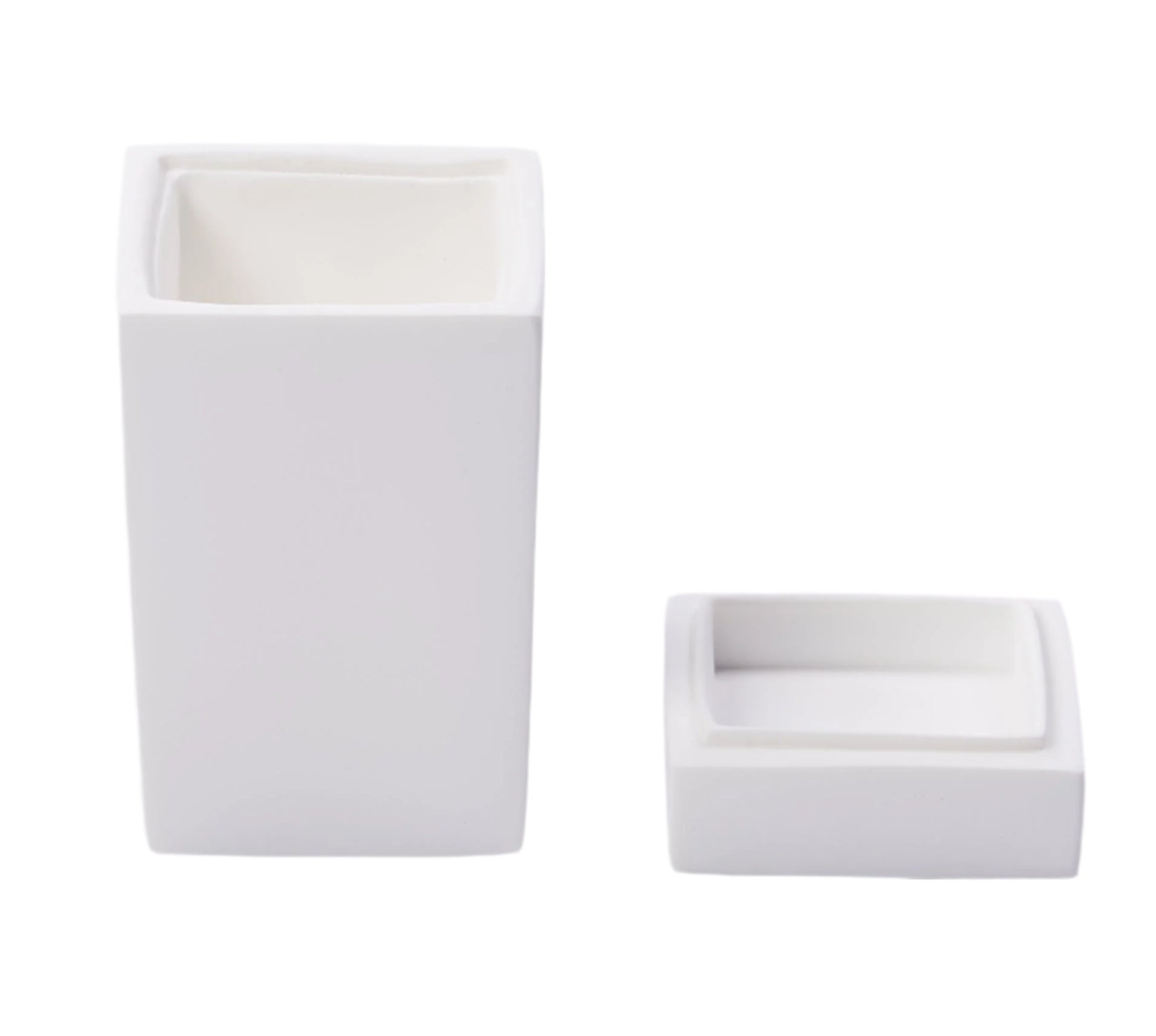 A tall rectangular soap dispenser and a shorter square dish from the Solid White Resin Bath Collection by Nashi Home make perfect additions to your bath accessories, shown here against a plain background.