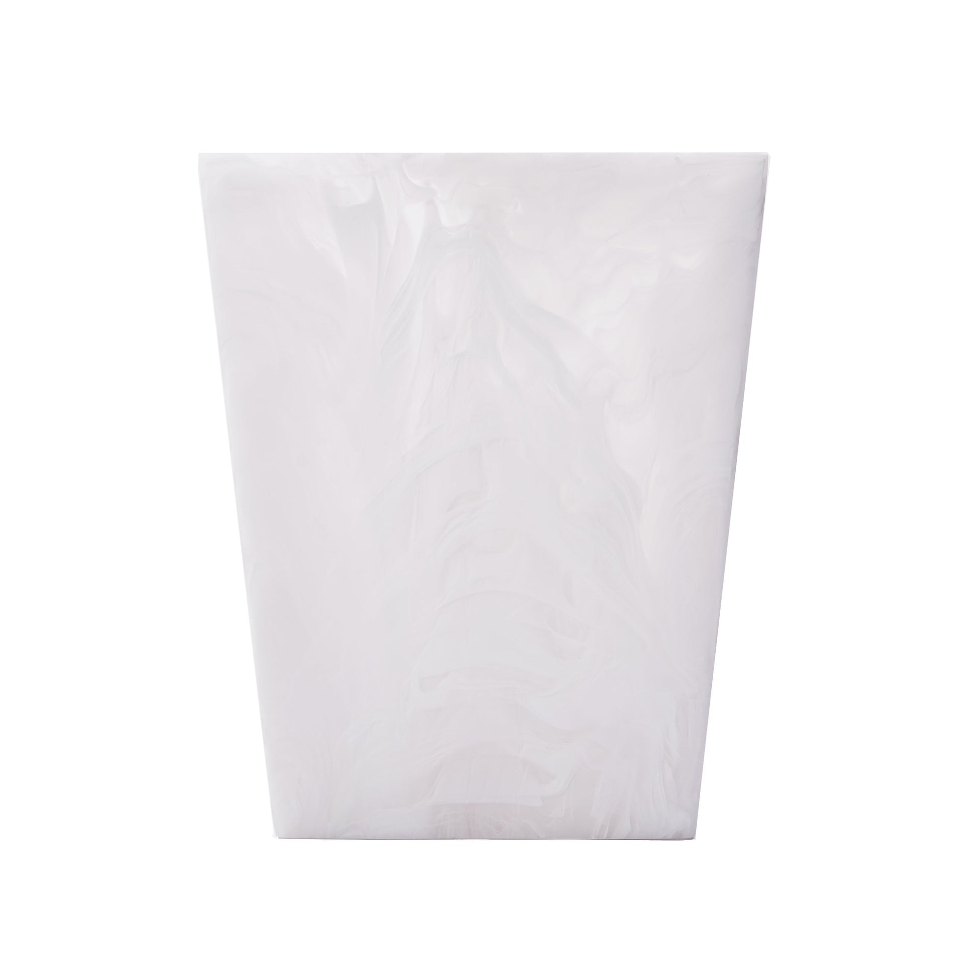 The Nashi Home Bath Collection's Swirl White waste basket is a white, rectangular, tapered bin with a marbled texture—ideal for fans of resin bath collections.