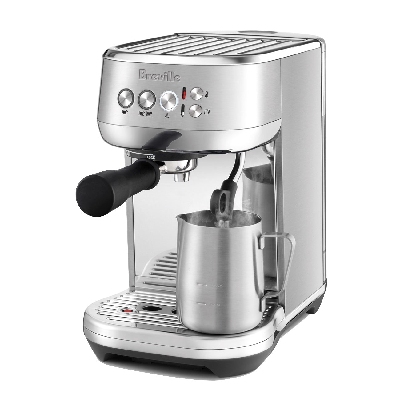 The Breville Bambino Plus Espresso Machine with ThermoJet heating expertly steams milk in a metal pitcher using its steam wand—ideal for making specialty coffee drinks.