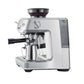 The Breville Barista Express Impress Espresso Machine boasts a stainless steel build, portafilter, bean hopper, and milk frothing pitcher under the steam wand—perfect for specialty coffee enthusiasts.