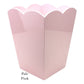 A pale pink waste bin from the Addison Ross Scalloped Lacquer Collection, featuring a scalloped-edge container and an elegant faceted design.