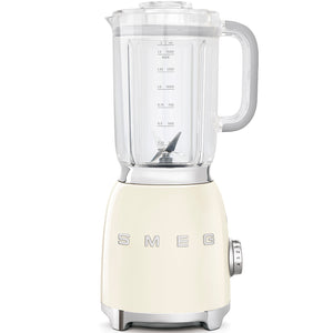 The SMEG Blender Collection by Smeg features a cream-colored, powder-coated body and Tritan BPA-Free jug with measurement markings, stainless steel dual blades, a transparent container, and chrome-accented dial for effortless blending.