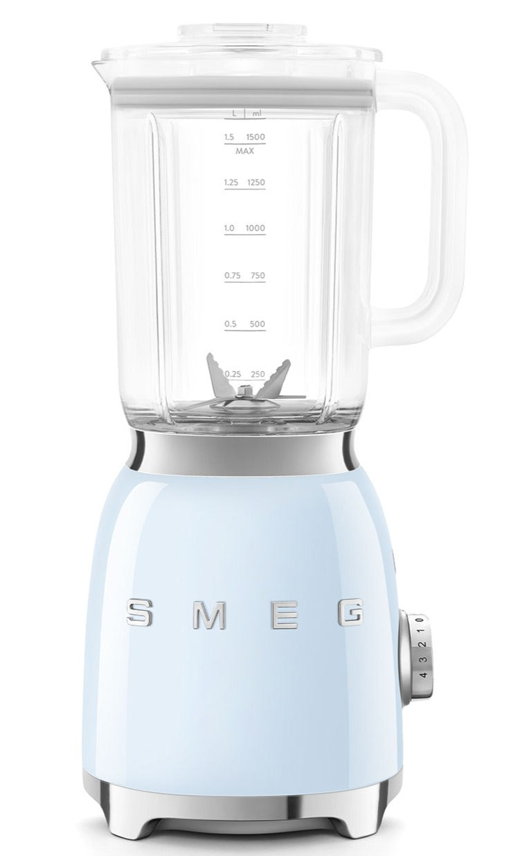 The SMEG Blender Collection from Smeg in pastel blue boasts a Tritan BPA-Free jug with measurements, a powder-coated exterior, stainless steel dual blades, and a stylish silver control knob, perfectly blending style and functionality.