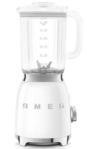 A Smeg blender from the SMEG Blender Collection features stainless steel dual blades, a transparent Tritan BPA-free jug with measurement markings, and a silver dial on its base.