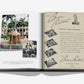 An open book, "The Boca Raton: A Century of Being Iconic" by Assouline, displays a decorative fountain photo on the left page and a vintage ad for the luxury resort The Boca Raton on the right.