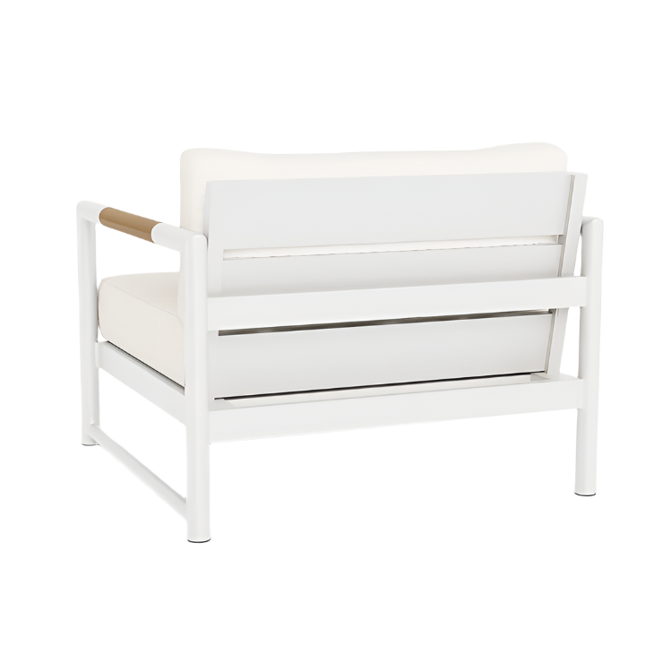 The HARBOUR OUTDOOR Breeze XL Lounge Chair in White Panama Blanco features a sturdy aluminum frame, solid teak arm accents, and plush white cushions for outdoor comfort, shown from the back.