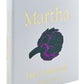 Graphic Image’s "Martha: The Cookbook, Leather Bound" features a gold title and artichoke illustration on a light gray cover and is filled with favorite Martha Stewart recipes.