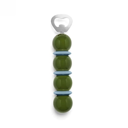 Introducing the Bobbin Bottle Opener from Addison Ross—a decorative and stylish gift featuring a handle made of four stacked green spheres separated by blue rings, topped with a durable carbon steel opener. This piece from the Bobbin Bottle Opener Collection combines unique design with everyday functionality.