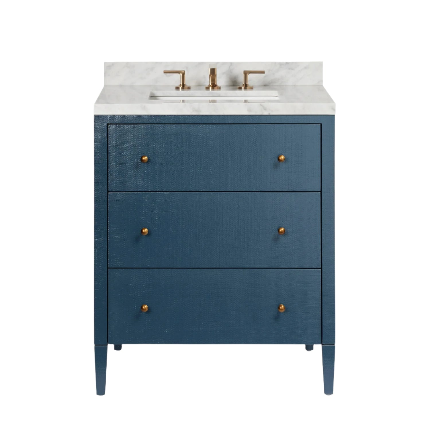 The Conrad Vanity Collection by Made Goods features a blue faux raffia bathroom vanity with three soft-close drawers, gold knobs, a marble countertop, and a brass faucet, shown against a white background.