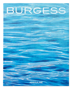 Book cover for "Burgess Yachts" by Assouline features the title in white above serene blue water ripples, reflecting the superyacht lifestyle, with "Assouline" at the bottom.