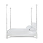 The Keller Bed by Bunny Williams features bamboo-style carved posts, shown neatly made with white bedding and two pillows, viewed from the side against a plain background.