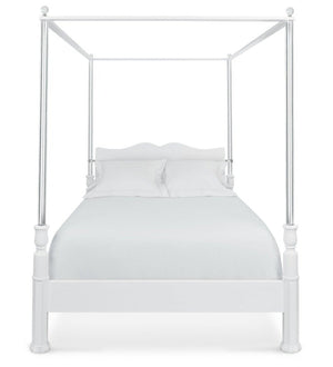 The Garbo King Bed by Bunny Williams features a classic four-poster canopy design, shown from the front with crisp white bedding and two pillows against a white background.