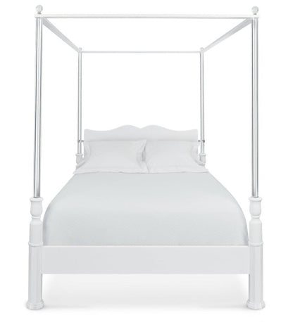 The Garbo King Bed by Bunny Williams features a classic four-poster canopy design, shown from the front with crisp white bedding and two pillows against a white background.