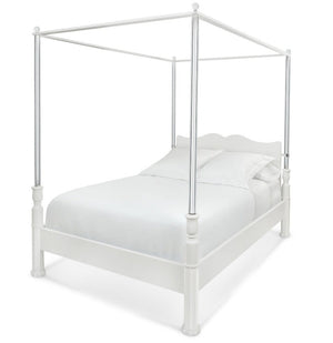 The Garbo King Bed by Bunny Williams features classic metal posts, a headboard, and crisp white bedding and pillows for an elegant, timeless style.