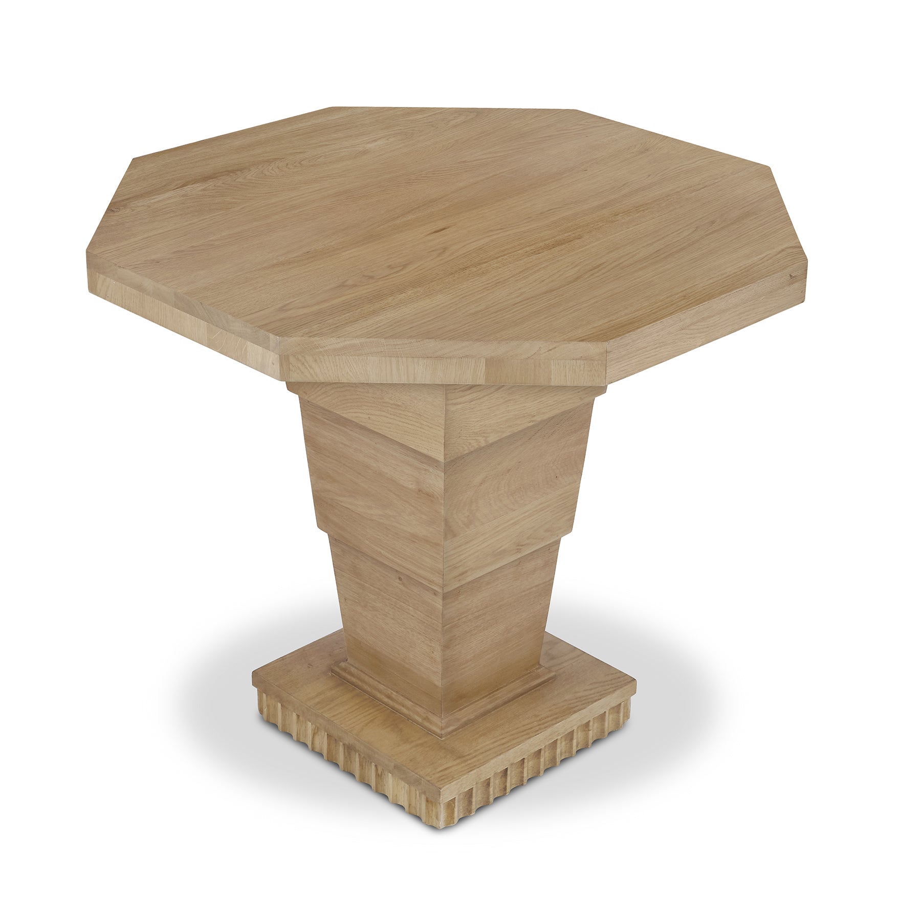 The Burton Side Table by Bunny Williams features an octagonal oak top and a tiered geometric pedestal base, shown against a white background.