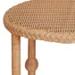 A close-up of the Bunny Williams Lucas Drinks Table, featuring a roomy round wicker top with braided edge and cylindrical wicker legs.