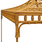 Close-up of the Bunny Williams Rattan Trellis Canopy Bed, showcasing its intricate lattice weaving, rounded edges, and natural wood finish.