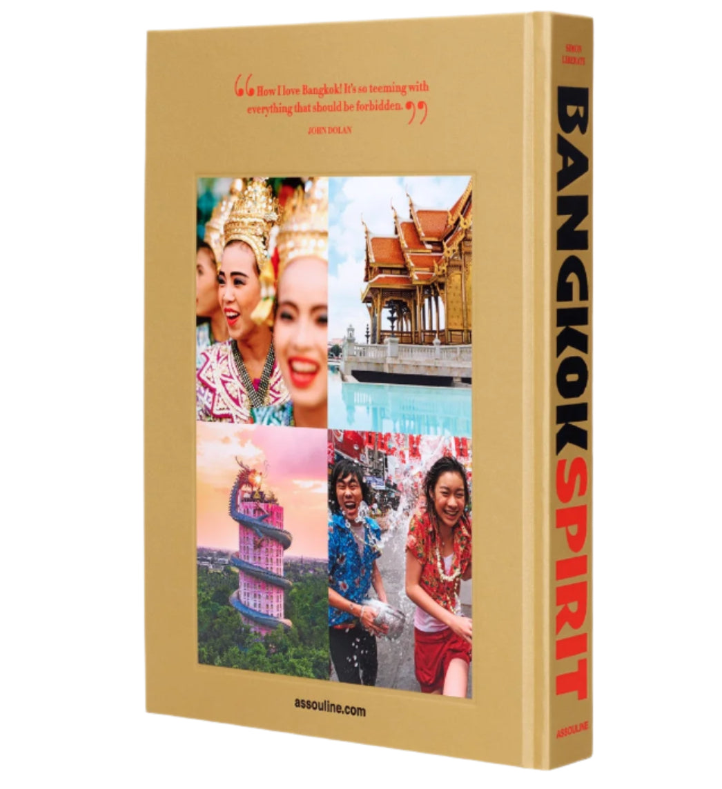 The cover of "Bangkok Spirit" by Assouline displays vivid images showcasing dynamic street life, iconic temples, and festivals against the backdrop of traditional Bangkok architecture.