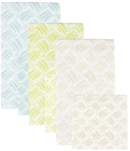 Four pastel, patterned rugs in various sizes, plus one square rug, overlap in a chic display—an ideal match for Caspari’s Basketry Napkin Collection at your next gathering.