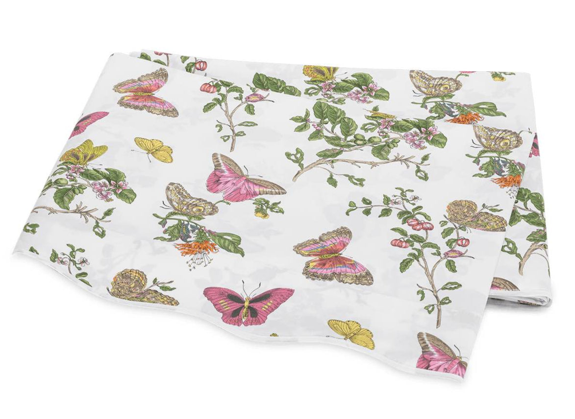 The Baudin Butterfly Pink Bedding Collection by Matouk features luxurious Egyptian cotton with a vibrant butterfly and botanical print.