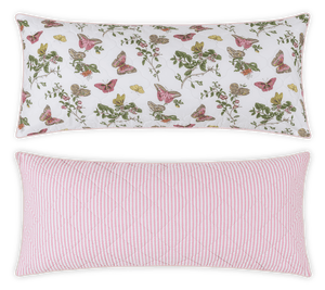 The Matouk Reversible Lumbar Pillow Collection features one butterfly and floral print pillow and one pink-and-white striped pillow, both displayed on a white background—ideal for customizable home decor.