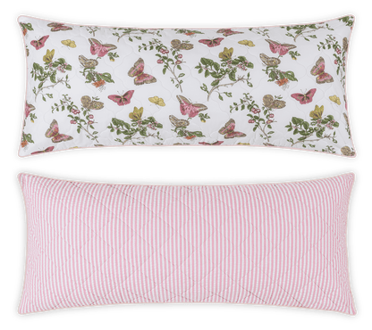 The Matouk Reversible Lumbar Pillow Collection features one butterfly and floral print pillow and one pink-and-white striped pillow, both displayed on a white background—ideal for customizable home decor.