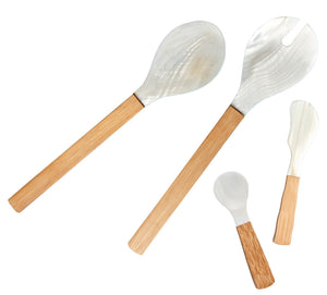 The Be Home Shell and Bamboo Serving Collection features four utensils—salad fork, spoon, spatula, and small spoon—with wooden handles and white heads, highlighting ethical craftsmanship against a clean white background.