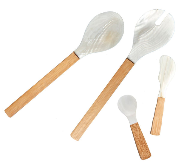 The Be Home Shell and Bamboo Serving Collection, from Be Home, includes a range of ethically crafted kitchen utensils with wooden handles: a large spoon, a slotted spoon, a small spoon, and a small spreader, all elegantly displayed on a white background.