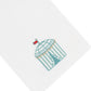 Introducing the Beach Cabana Bath Collection by Haute Home—a white premium Italian linen tissue box cover, featuring an embroidered blue and white striped cabana with a red flag on top.