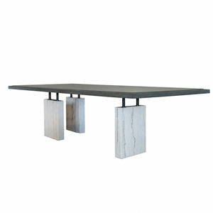 The Block Dining Table by Hickory Chair features a rectangular, minimalist design with a dark veneered wood top, elegantly supported by two substantial vertical white marble slab bases, shown against a plain white background.