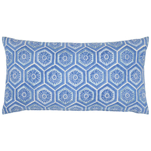 The Ravi Azure Bolster by John Robshaw is a rectangular pillow with a blue and white hexagonal pattern, each hexagon adorned with floral motifs and subtle embroidered details for extra texture.
