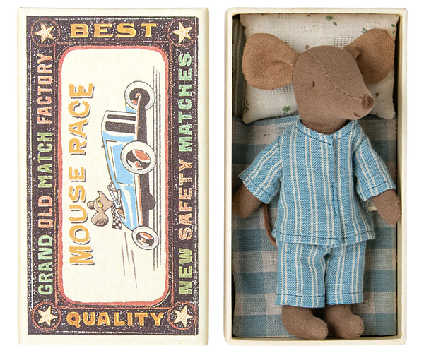 A Maileg Big Brother Mouse in Blue from Maileg lies in a small box resembling a vintage matchbox bed, labeled "Mouse Race" with an illustration of a mouse driving a car. The box boasts unique prints, making it visually charming and nostalgic.