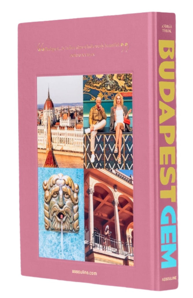 The book "Budapest Gem" by Assouline showcases photos of Budapest's architecture, including a fountain, the Széchenyi Chain Bridge, and two people on its cover.