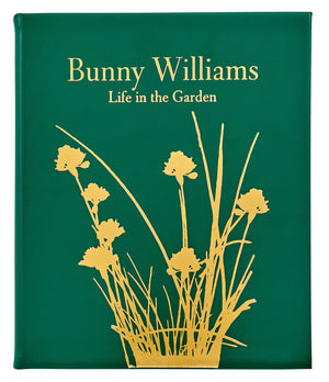 The Bunny Williams: A Life In The Garden, Leather Bound by Graphic Image features a green cover with a gold floral silhouette, reflecting Bunny Williams’ love of gardens and elegant design inspired by an eighteenth-century manor house.