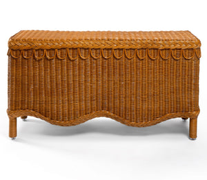 The Sharland England Bunny Bench is a rectangular wicker bench featuring a woven pattern, scalloped trim, and four short legs, hand-crafted for timeless style and shown against a white background.