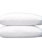 Two white Butterfield Bedding Collection, Ocean pillows by Matouk, featuring scallop detail and blue trim, are stacked on a plain background; they're crafted from luxurious Egyptian cotton percale.