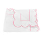 Butterfield Bedding Collection blanket by Matouk, featuring white fabric with pink scallop detailing along the trim and border, displayed against a plain white background.