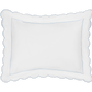Matouk’s Butterfield Bedding Collection, Blue, features a white rectangular pillow with scalloped edges and a subtle blue border, crafted from 500 thread count Egyptian cotton percale and photographed on a plain background.