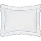 The Matouk Butterfield Bedding Collection features a white rectangular pillow with scalloped edges and a delicate blue border, displayed against a plain white background—an ideal accent for Egyptian cotton sheets or other premium percale sheeting, enhanced by its refined scallop detail.