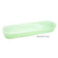 A large, light green oval bowl from the Mint Resin Serveware Collection by Nashi Home, made of shatter-resistant resin with smooth edges—ideal for stylish home decor.