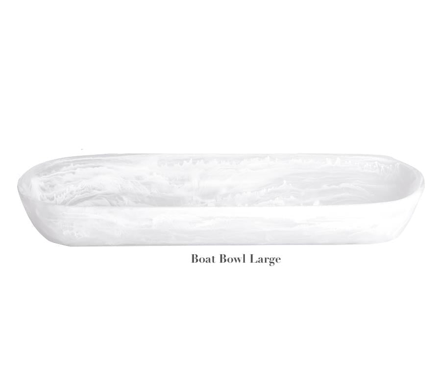 A large, oval white bowl with a marbled texture from the White Resin Serveware Collection by Nashi Home rests on a plain background—a stunning centerpiece for serving and enhancing any home decor.