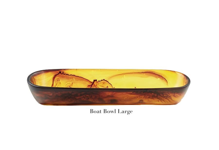Add shatter-resistant elegance to your decor with the Tortoise Resin Serveware Collection by Nashi Home, featuring large, rectangular amber bowls with rounded edges and marbled brown patterns.